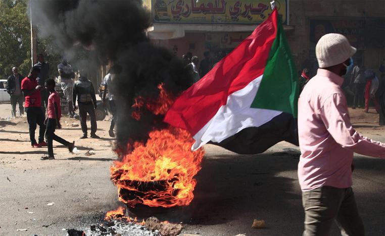 Protesters brave tear gas to demonstrate against military rule 