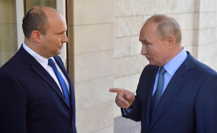 Russian President Vladimir Putin talks to Israeli Prime Minister Naftali Bennett 