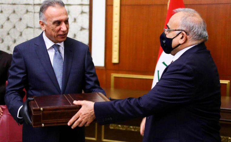 رئيس الوزراء العراقي السابق عادل عبدالمهدي مع رئيس الوزراء المعين مصطفى الكاظمي