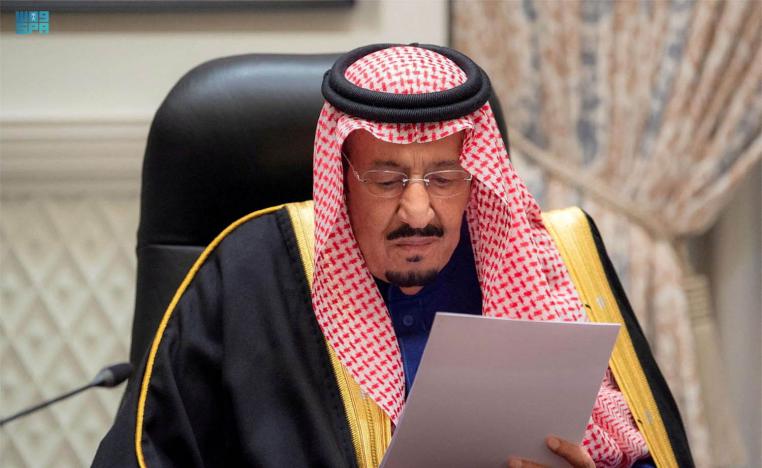 King Salman was briefly shown on state television looking at a big screen