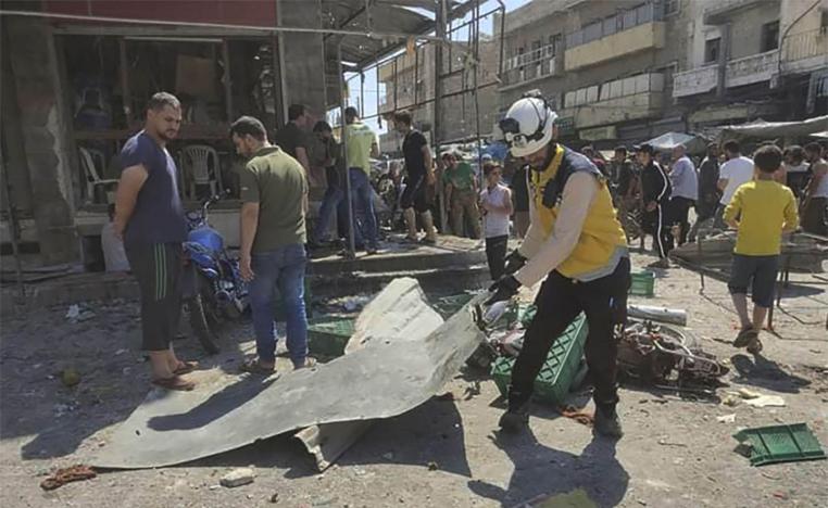 The attack on the town of al-Bab came days after a Turkish airstrike killed at least 11 Syrian troops and US-backed Kurdish fighters