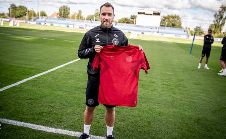 The three Denmark shirt designs appear to comply with no words or symbols that are an explicit statement