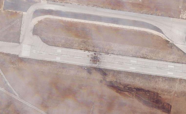 The runway damage after an Israeli strike targeted the Aleppo International Airport