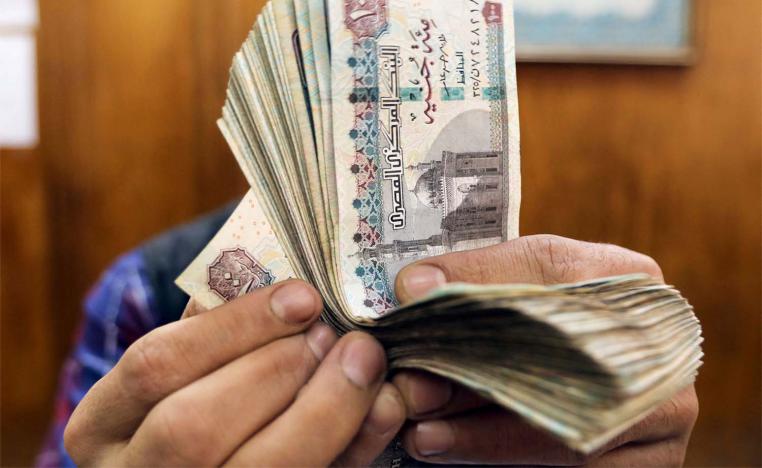 Following the central bank’s announcement, the Egyptian pound dropped in value against the US dollar 