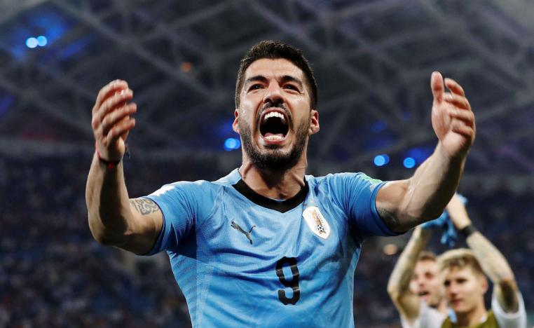 عض سواريس كتف المدافع جورجو كييليني بلا رحمة