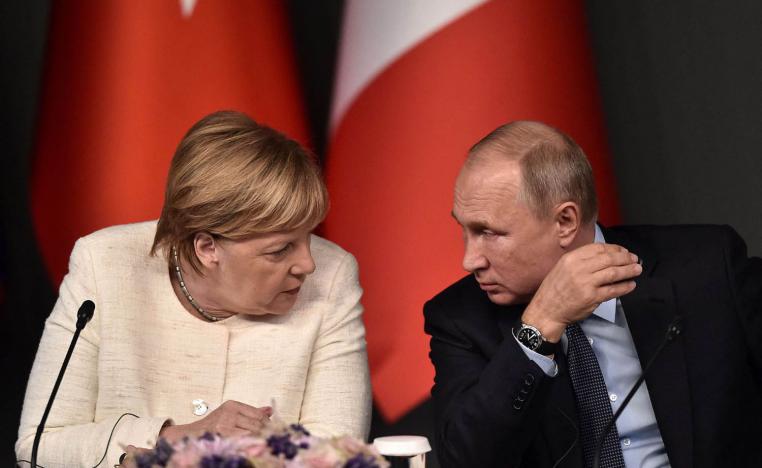 الرئيس الروسي فلاديمير بوتين مع المستشارة الألمانية في حينها انغلا ميركل (2018)