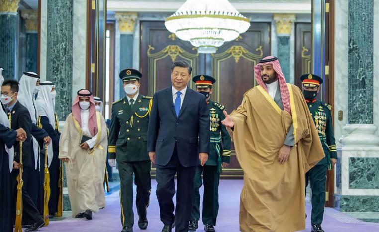 Chinese President Xi Jinping, left, is greeted by Saudi Crown Prince and Prime Minister Mohammed bin Salman