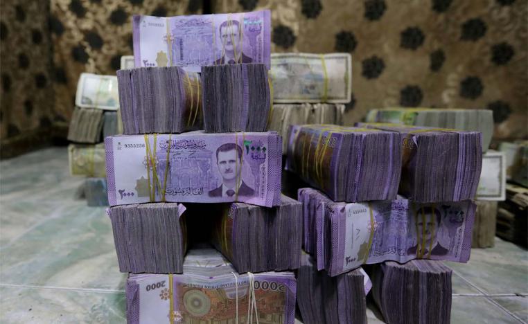 The Syrian pound had traded at 47 to the dollar before anti-Assad protests in March 2011
