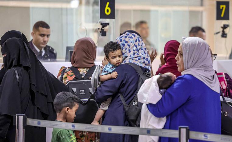 oroccan citizens evacuated from Sudan upon arrival at the Casablanca Mohammed V Airport 