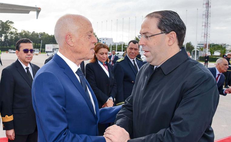 Chahed (R) was prime minister from 2016-20