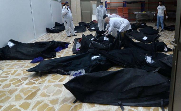 Bodies of people killed in a fire during a wedding in an event hall in Qaraqosh