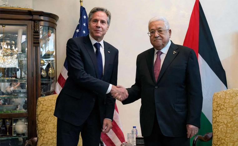 Abbas shaking hands with Blinken