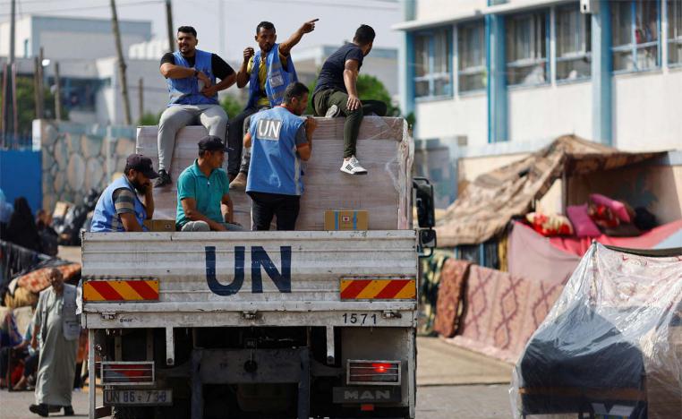 UN workers arrive to distribute aid to Palestinians in Khan Younis