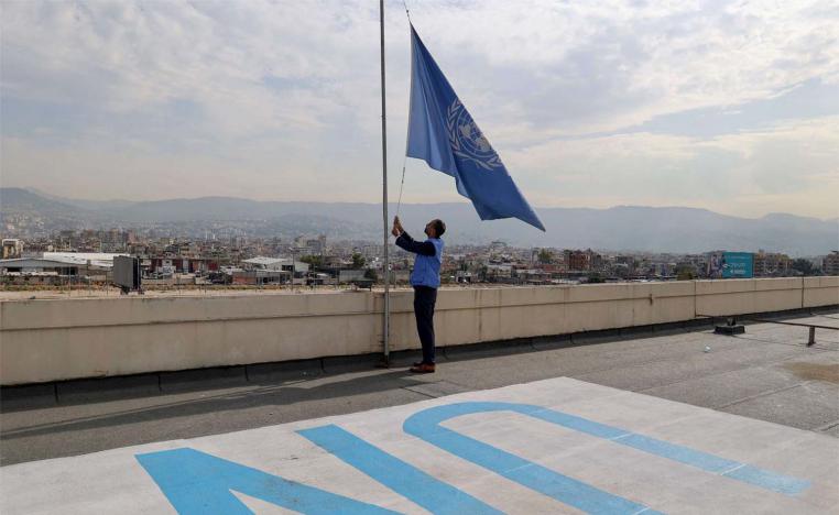 The UN flag flies at half mast