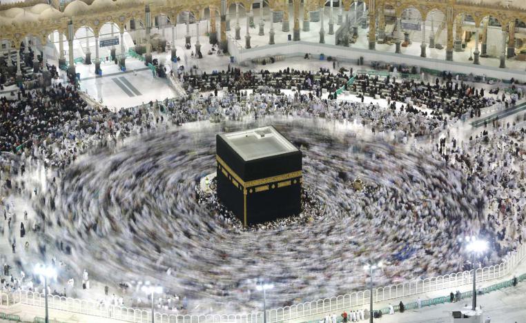 Muslim pilgrims circumambulate the Kaaba, the cubic building at the Grand Mosque, in the Muslim holy city of Mecca