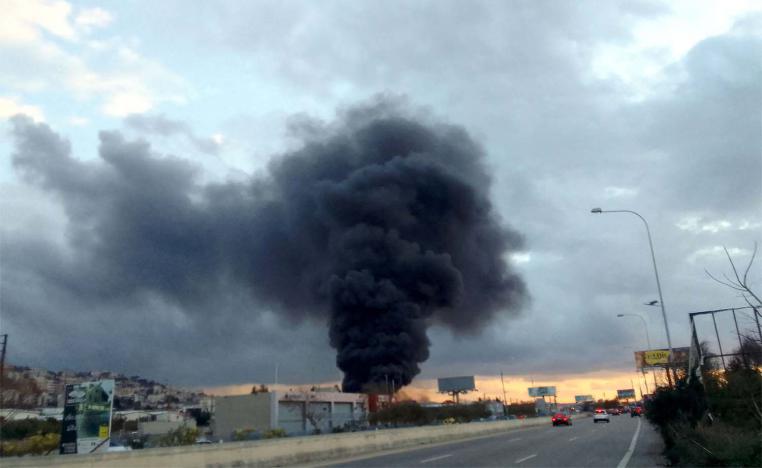 Smoke billows from the site of a reported Israeli airstrike in Ghaziyeh