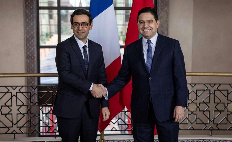 Sejourne shaking hands with Bourita during his visit to Morocco last February