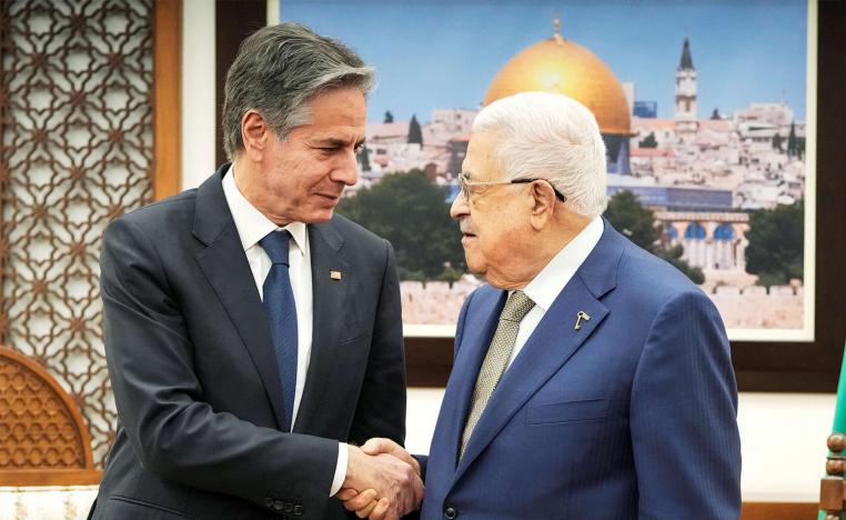 Abbas shaking hands with Blinken