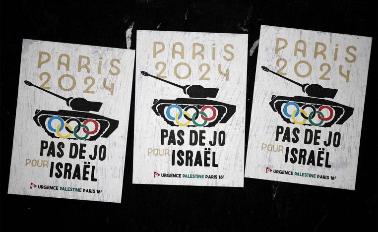 Posters saying No Olympics for Israel are pictured in the 18th arrondissement district in Paris