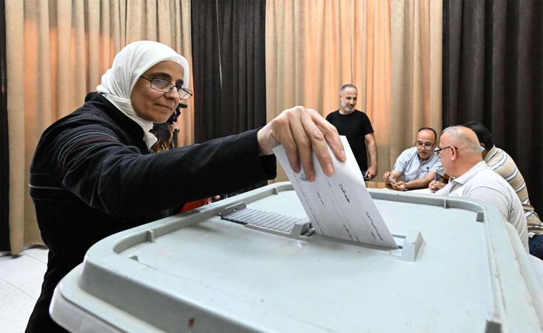 Voters are electing 250 lawmakers to parliament, which has little real power in Syria's presidential system
