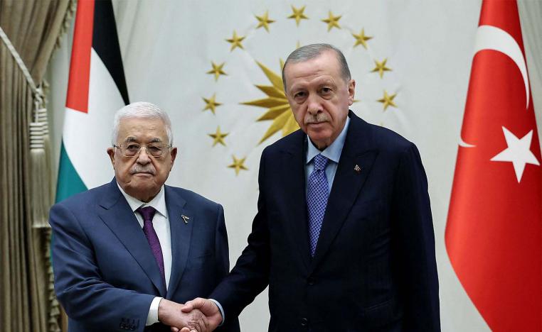  Turkish President Recep Tayyip Erdogan (R) shaking hands with Palestinian Authority President Mahmoud Abbas 