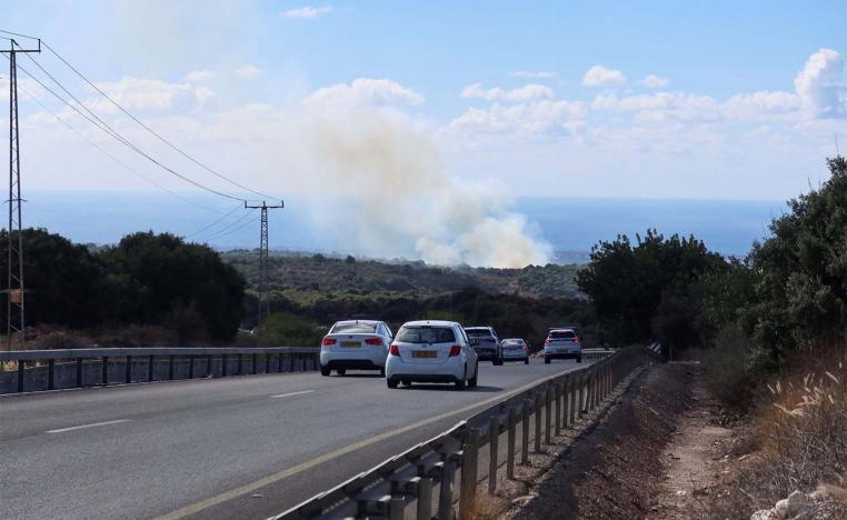 Smoke rises above the western Galilee