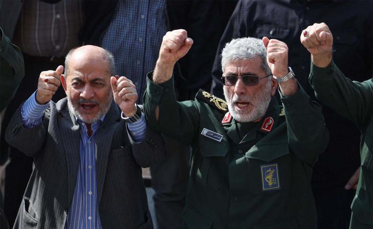 Qaani (R) gestures during the funeral ceremony for slain Guards commander Abbas Nilforoushan in Tehran