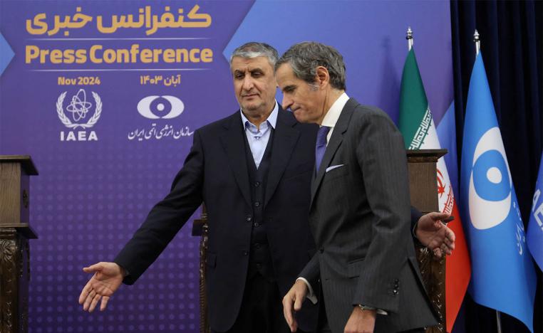 IAEA Director General Rafael Mariano Grossi and Head of Iran's Atomic Energy Organization Mohammad Eslami