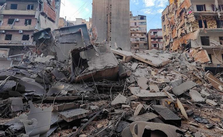 Rubble lies at a site damaged in the aftermath of Israeli strikes on Beirut's southern suburbs