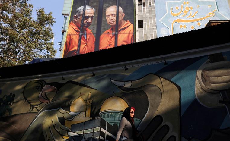 A picture of Israel's PM Benjamin Netanyahu and former Defense Minister Yoav Gallant is displayed on a building in Tehran