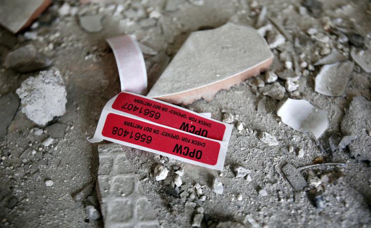 abels of the Organisation for the Prohibition of Chemical Weapons are seen inside a damaged house in Douma in Damascus
