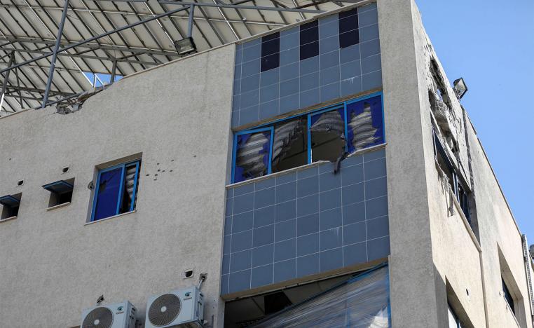 Al-Ahli Arab Baptist hospital stands damaged following an Israeli strike
