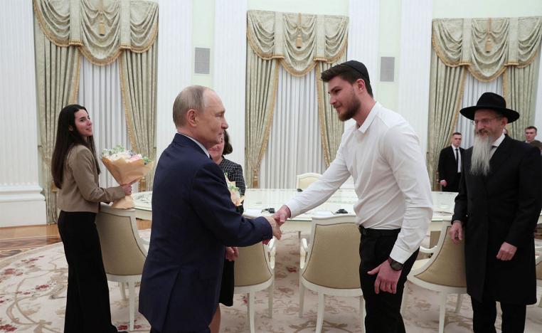  Putin shaking hands with Alexander Trufanov