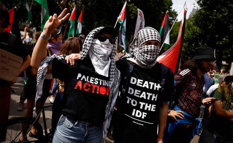 Palestine Action activists gathering outside the High Court in London 