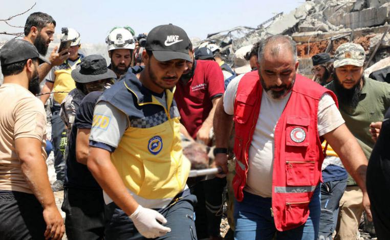  Rescue teams evacuate the victims from amid the rubble following a blast that rocked Idlib