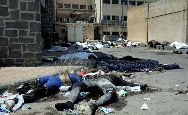 Bodies of people killed during sectarian violence lie outside Sweida National Hospital