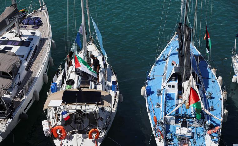 Boats of a humanitarian flotilla with aid and pro-Palestinian activists in Barcelona