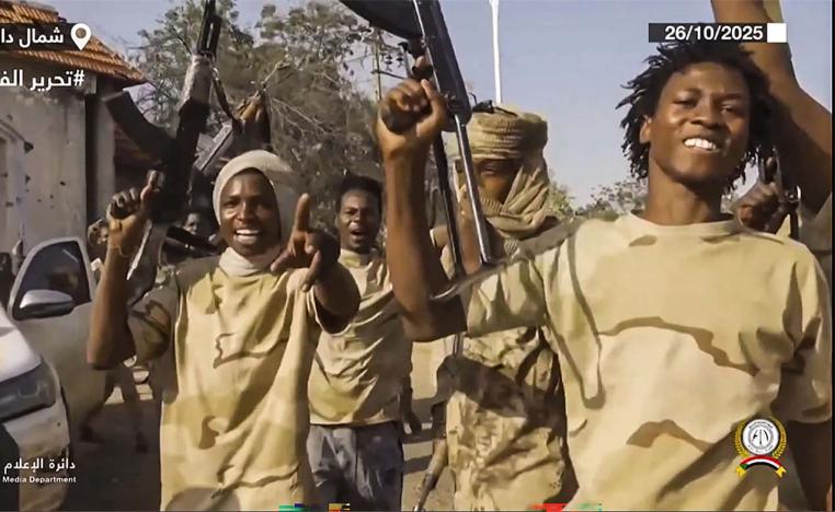 RSF fighters celebrating the capture of al-Fashir