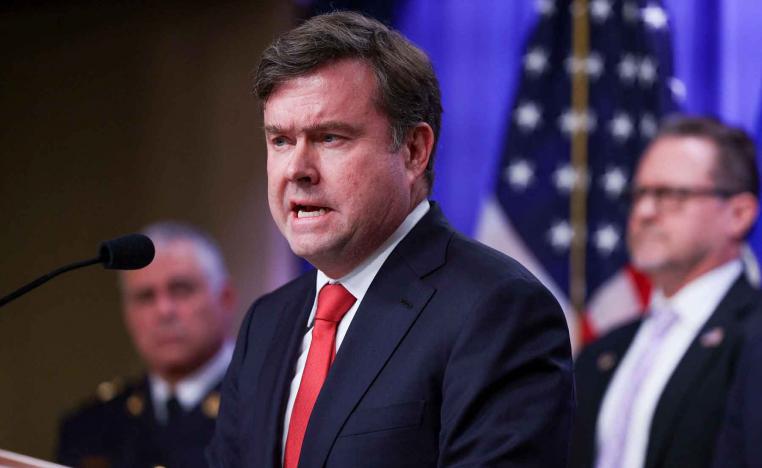 US Undersecretary of the Treasury for Terrorism and Financial Intelligence John Hurley speaks during a news conference at the Department of Justice in Washington, November 19, 2025.