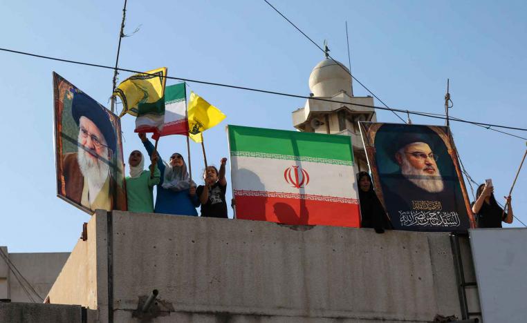 People celebrate what they say is Iran’s victory, after US President Donald Trump announced a ceasefire between Israel and Iran, in Beirut, June 25, 2025. 