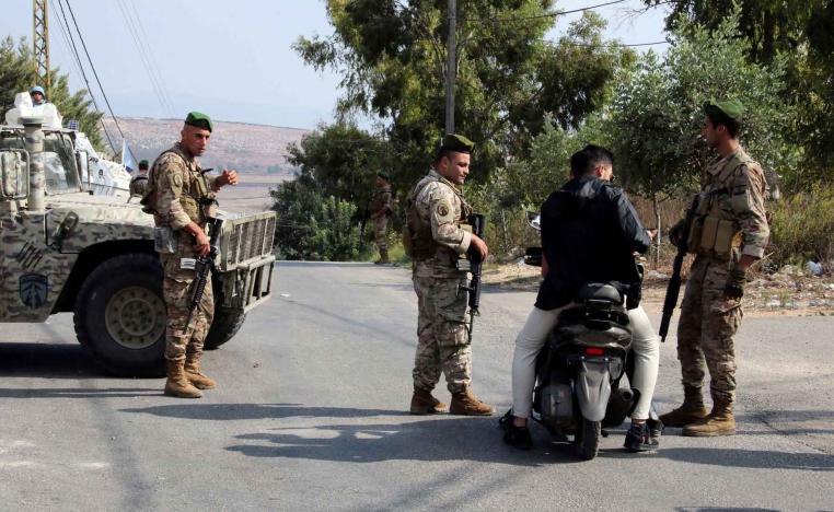 Lebanese army members man a checkpoint in Marjayoun, near the border with Israel, in southern Lebanon. 