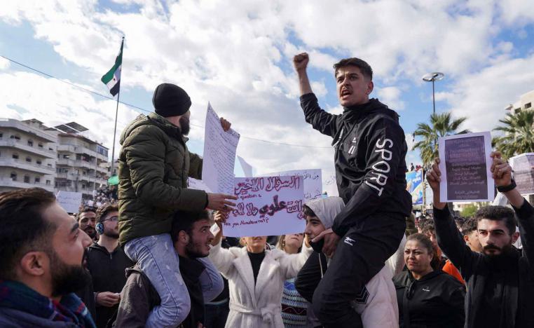 People from the Alawite sect protest as they demand federalism and an end to what they say is the killing and violations against Alawites, in Latakia, Syria, December 28, 2025. 