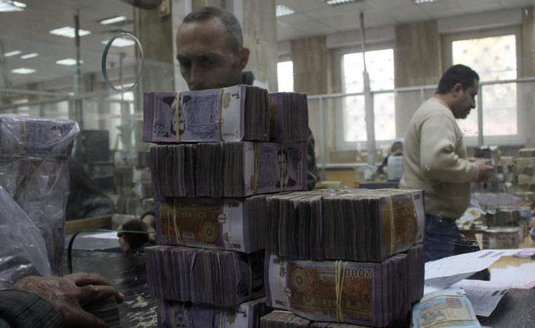 اتفاق على إزالة صور الأسد