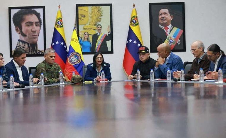 Venezuela's acting president Delcy Rodríguez (C)