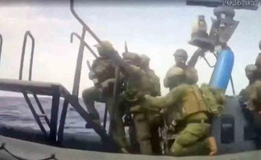 An Israeli naval boat intercepts the Global Sumud Flotilla en route to Gaza
