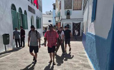 Tourists walking in the medina of the northern city of Assilah