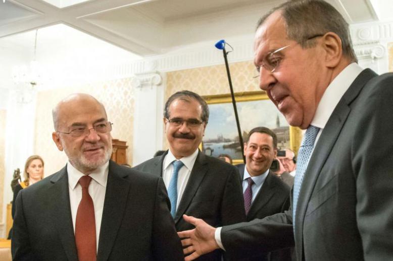 Russian Foreign Minister Sergei Lavrov (R) welcomes his Iraqi counterpart Ibrahim al-Jaafari during a meeting in Moscow, last February