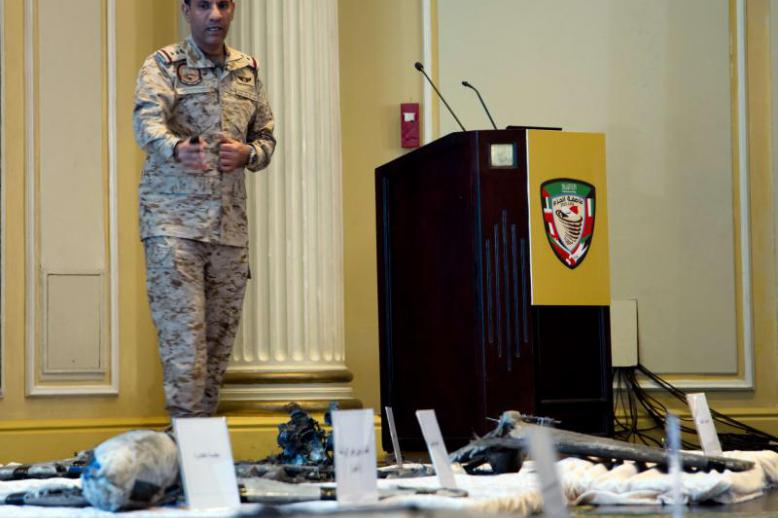 Colonel Turki al-Malki, spokesman for the Saudi-led coalition in Yemen, displays wreckage from Iranian-Houthi suicide drones in Khobar city, last April