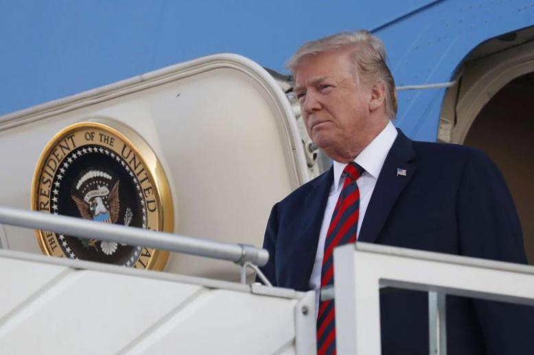 US President Donald Trump arrives at the airport in Helsinki on the eve of his meeting with Russian President Vladimir Putin, on July 15