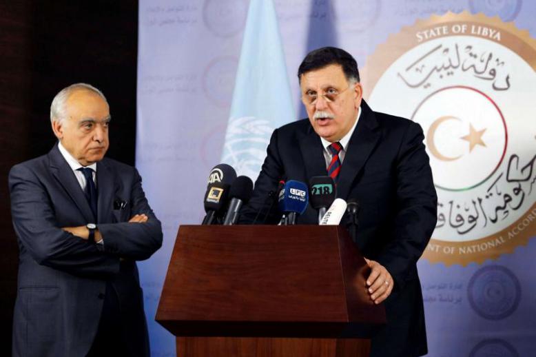 Head of Libyan Presidency Council Fayez al-Sarraj (R) speaks during a news conference with UN Envoy to Libya Ghassan Salame in Tripoli